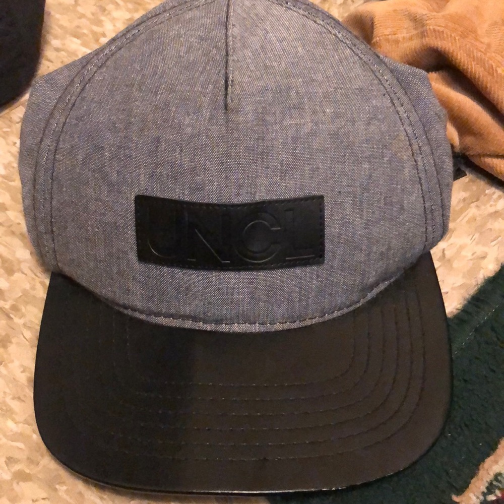 Black and grey UNCL strapback